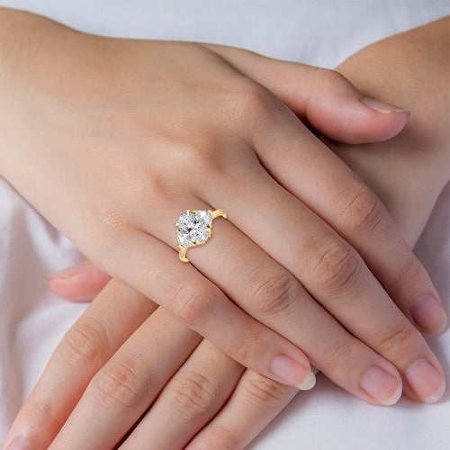 3.50ctw Oval with Half Moon Lab-Grown Diamond 3-Stone Engagement Ring in 14k in Yellow Gold on hand