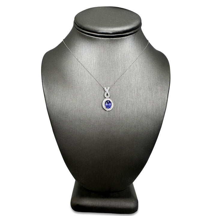 Oval Tanzanite and Round Brilliant Diamond Halo Pendant Necklace in 14k White Gold