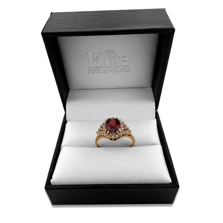 Oval Garnet and Diamond Halo Cocktail Ring in 14k Yellow Gold