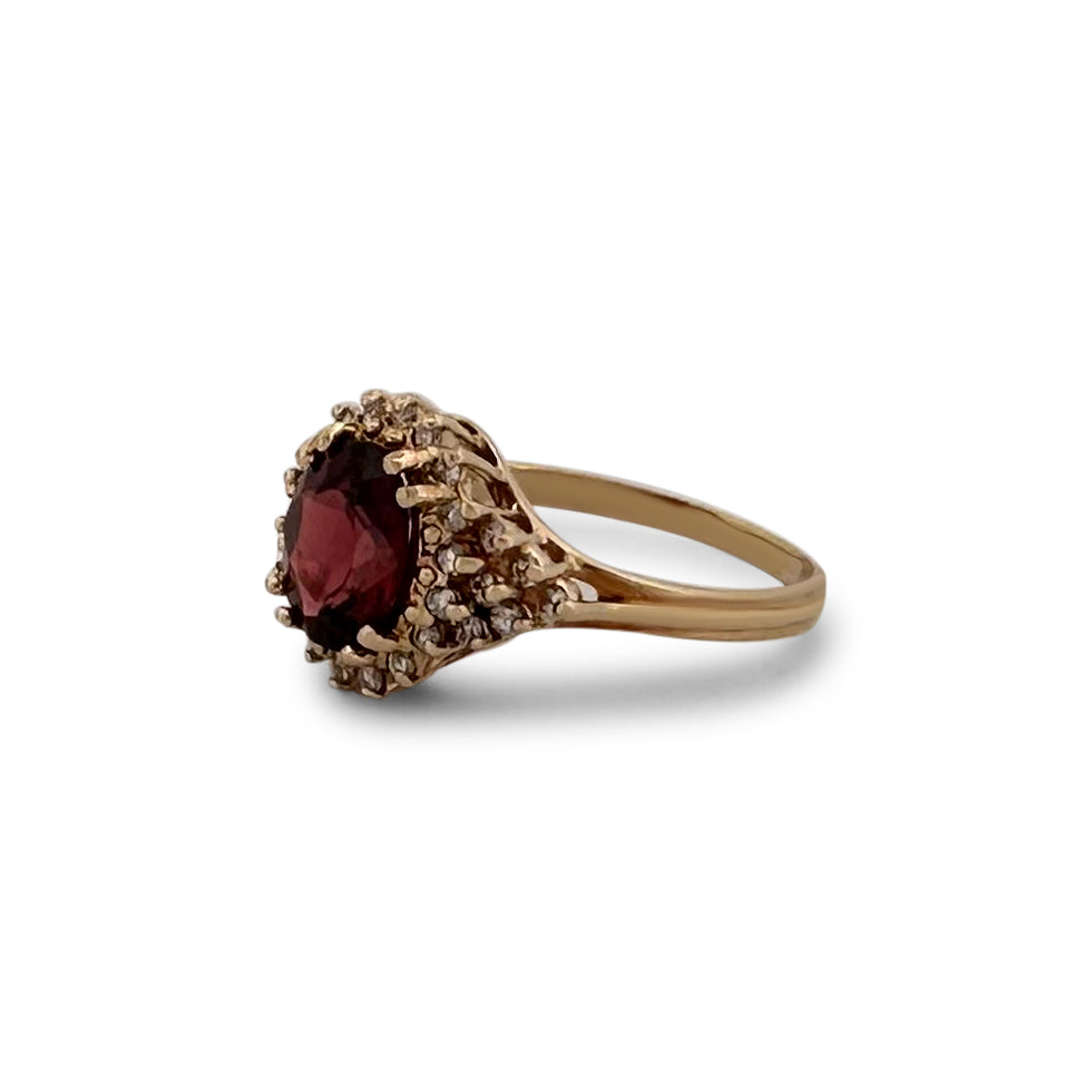 Oval Garnet and Diamond Halo Cocktail Ring in 14k Yellow Gold